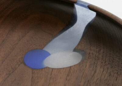 Walnut bowl with three blue inlays